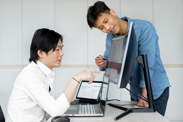 Men Looking the Monitor Together